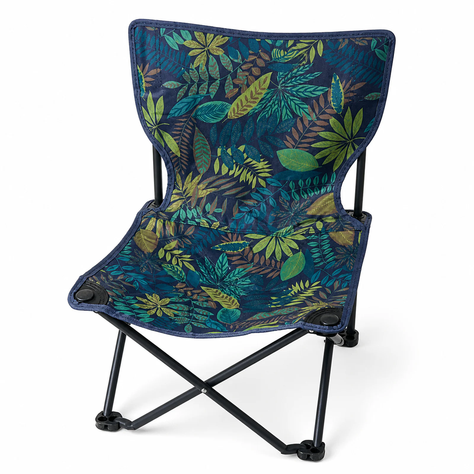 Tropical print folding beach chair on a white background